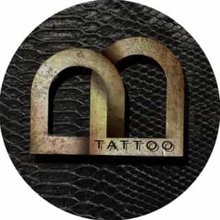 T&T Tattoo logo