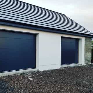 Optimum Doors& Garage door spares logo