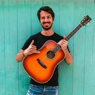 The Groovy Guitar Dude logo