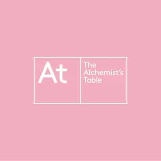 The Alchemist's Table at Home logo