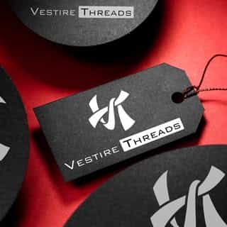 Vestire Threads logo