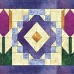 QuiltWoman.com logo
