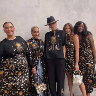 Never Fully Dressed logo