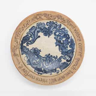 Tokheim Stoneware logo